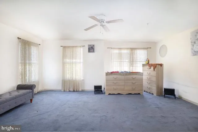 a room with furniture and window