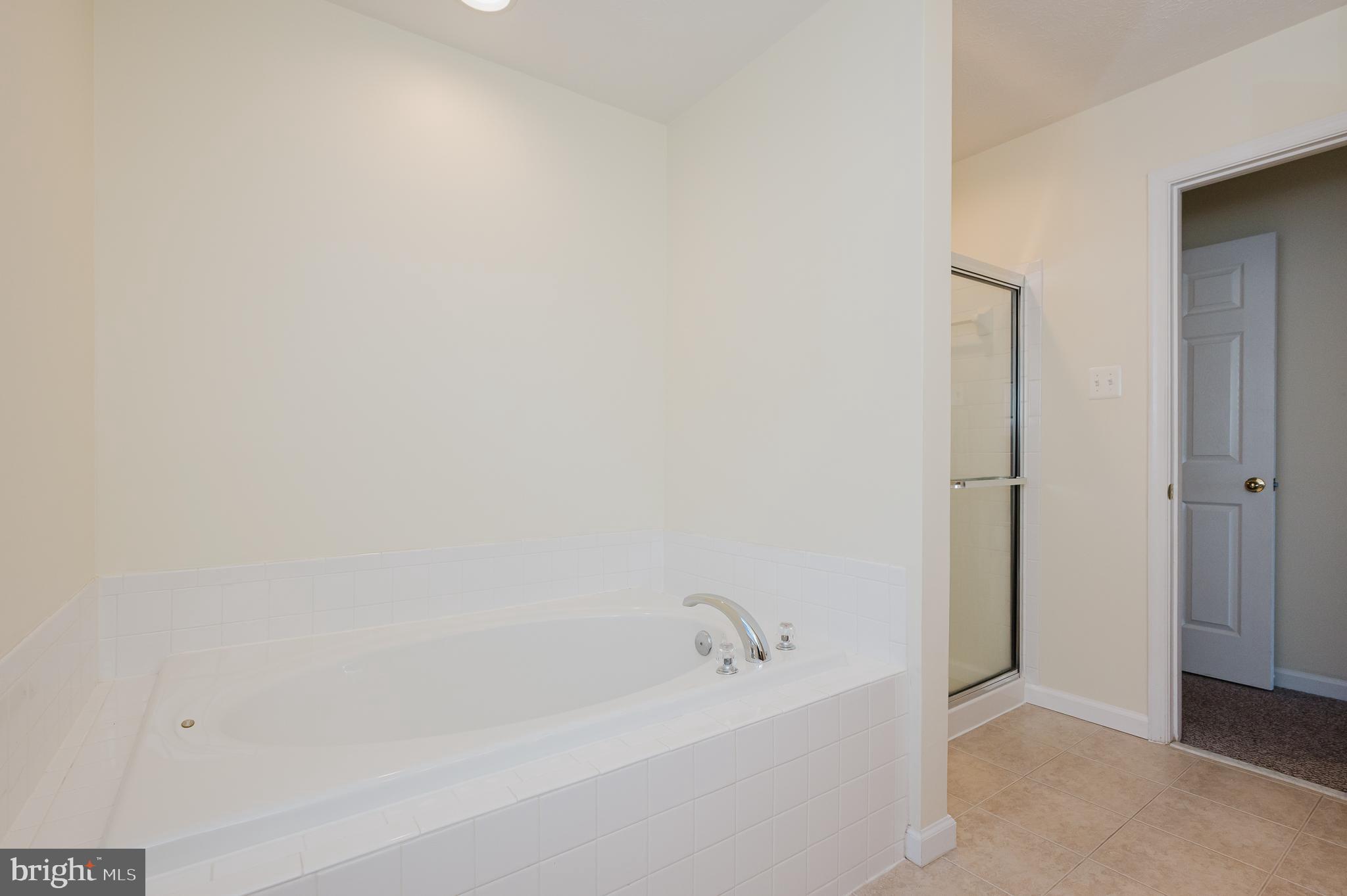 719 MacDill Road Middle River, MD 21220 - Photo 11 of 35 a bathroom with a bathtub