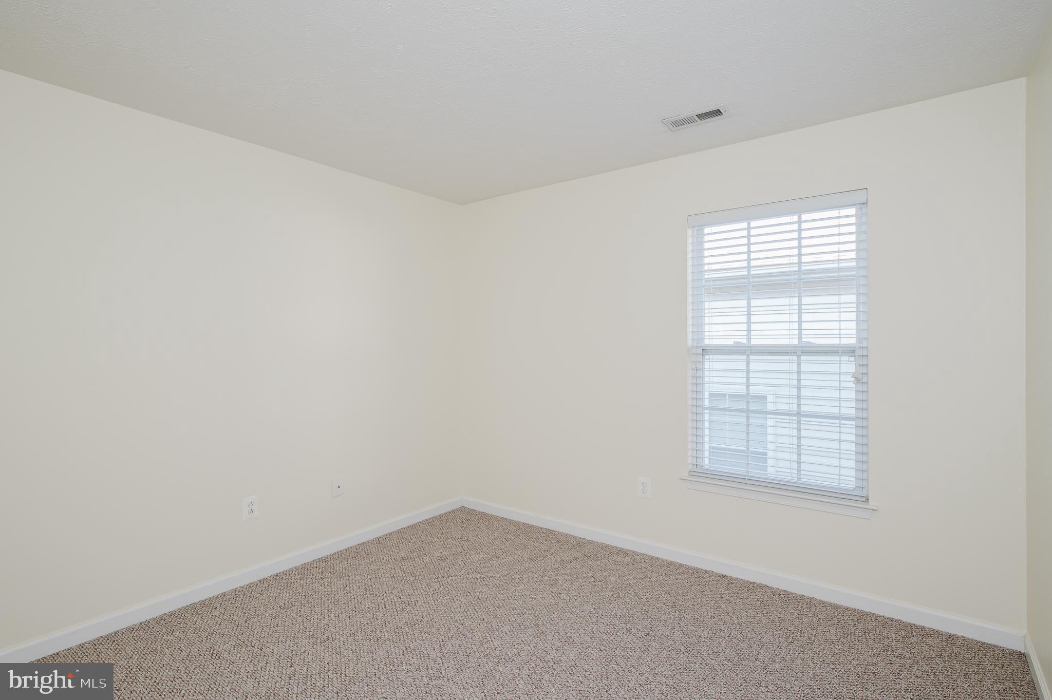 719 MacDill Road Middle River, MD 21220 - Photo 16 of 35 an empty room with windows