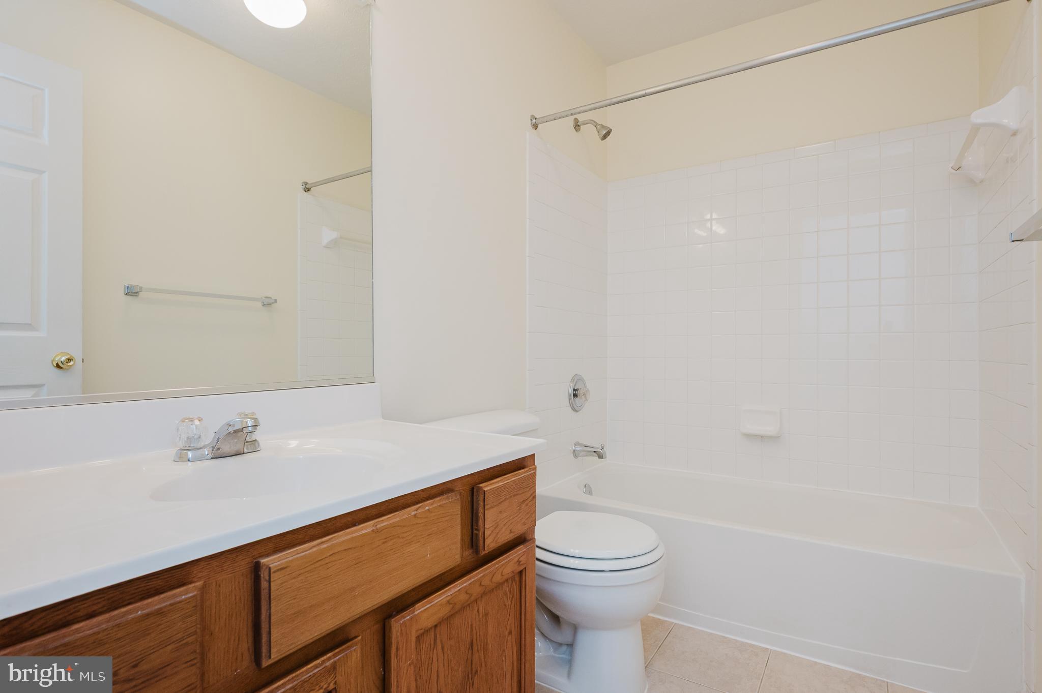719 MacDill Road Middle River, MD 21220 - Photo 19 of 35 a bathroom with a sink a toilet and shower