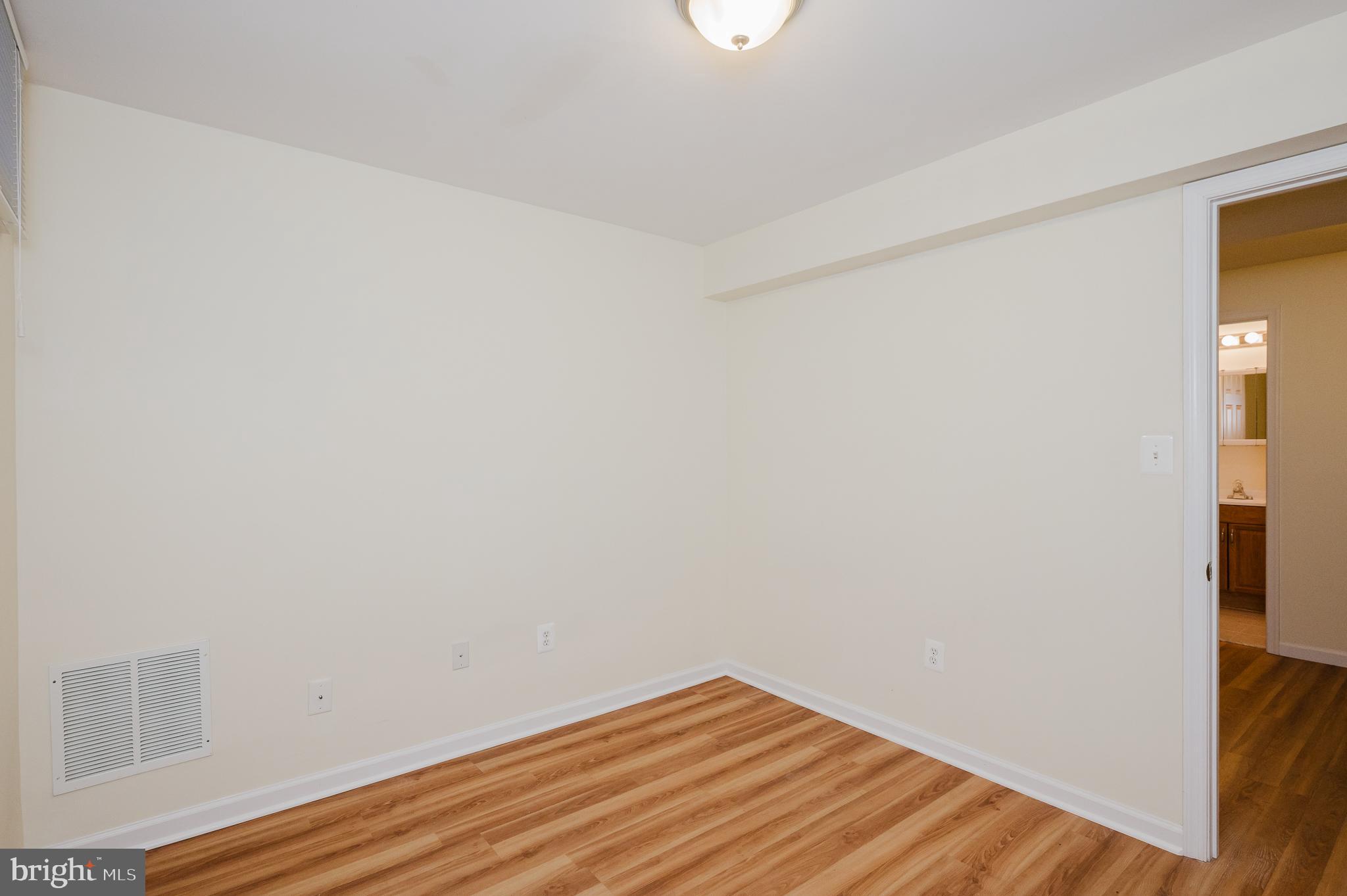 719 MacDill Road Middle River, MD 21220 - Photo 25 of 35 a view of a small space with wooden floor and a window