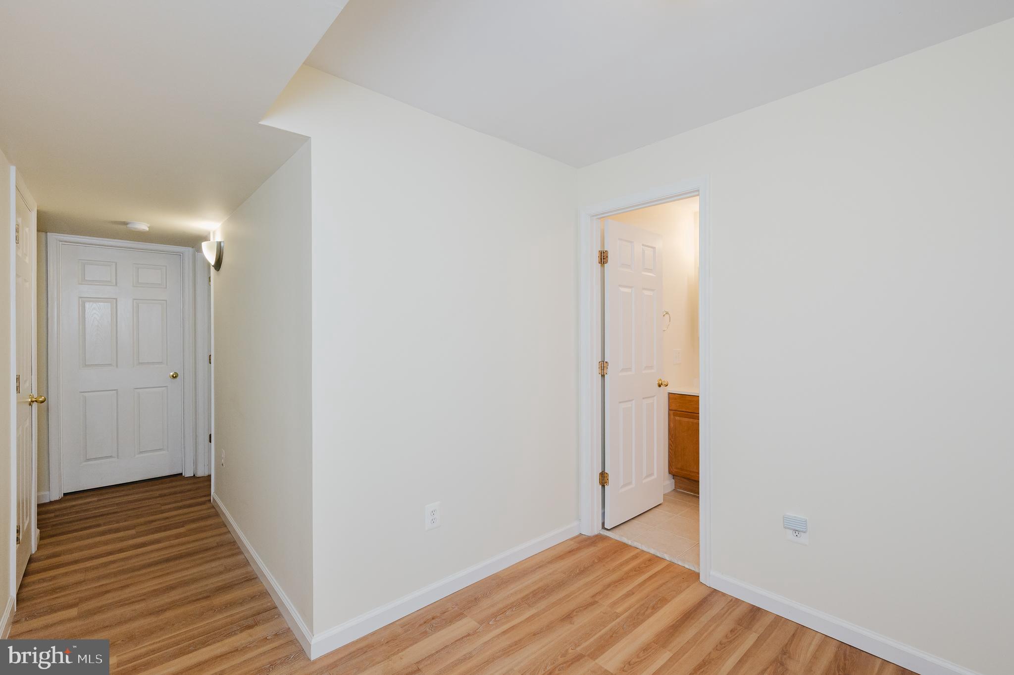 719 MacDill Road Middle River, MD 21220 - Photo 28 of 35 a view of a room with wooden floor and a hallway
