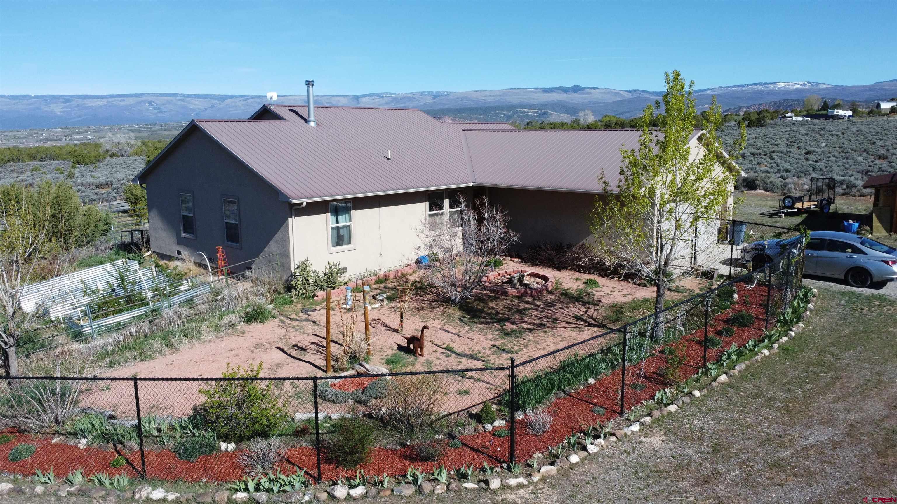 14617 2800th Road Hotchkiss, CO 81419 - Photo 1 of 37 an aerial view of a house