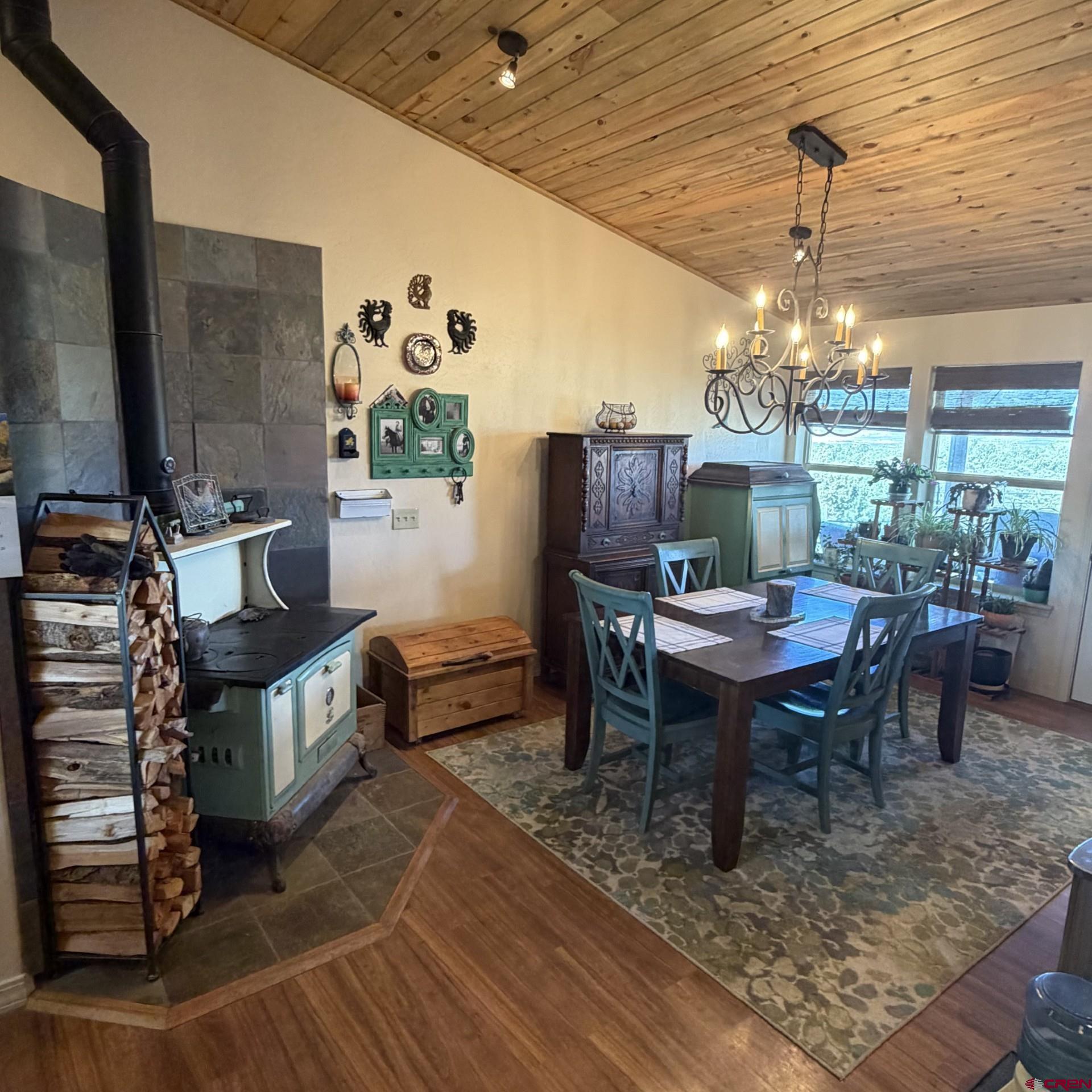 14617 2800th Road Hotchkiss, CO 81419 - Photo 20 of 37 a view of a dining room with furniture window and outside view
