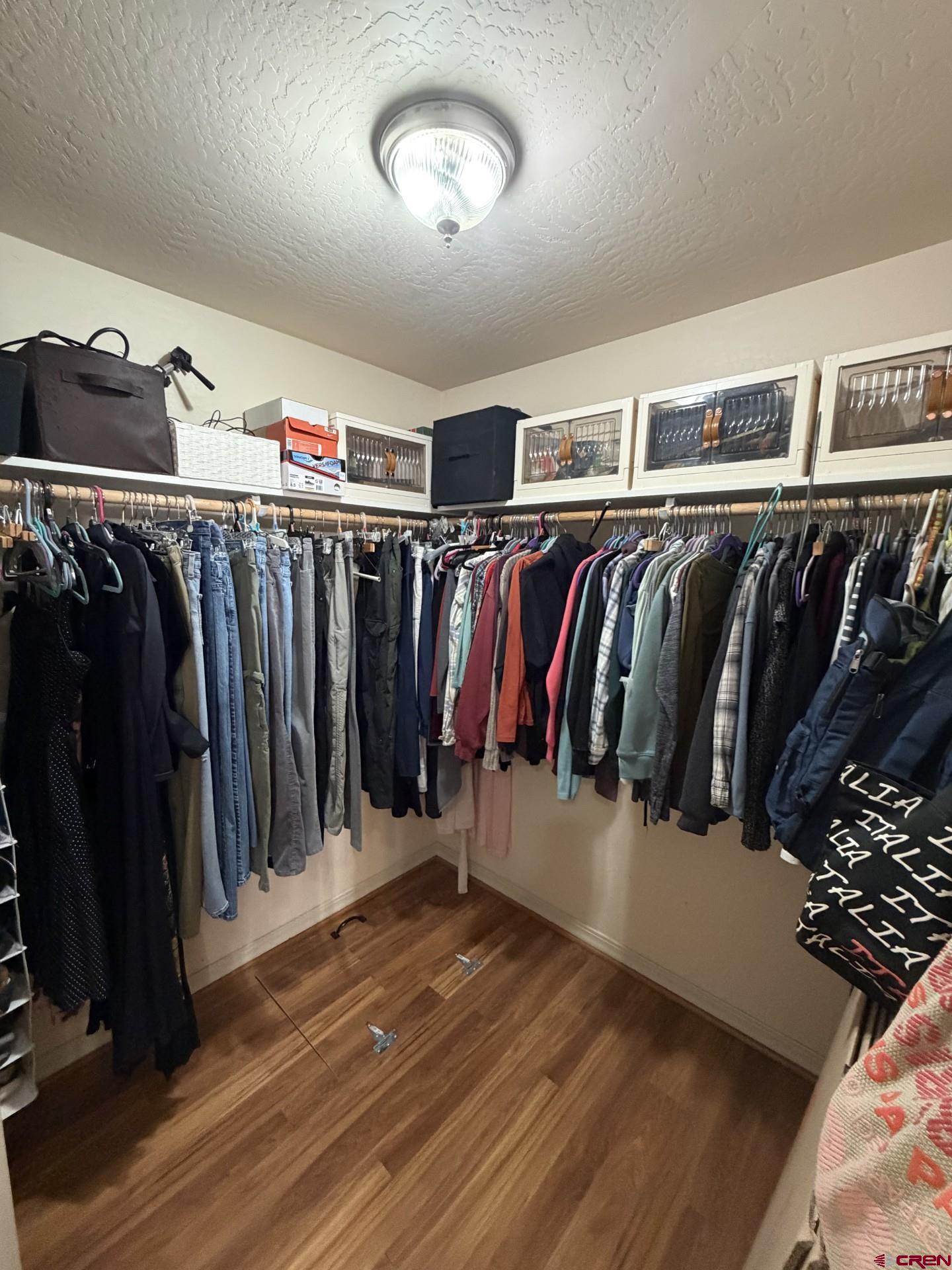 14617 2800th Road Hotchkiss, CO 81419 - Photo 24 of 37 a view of walk in closet with clothes and shoes