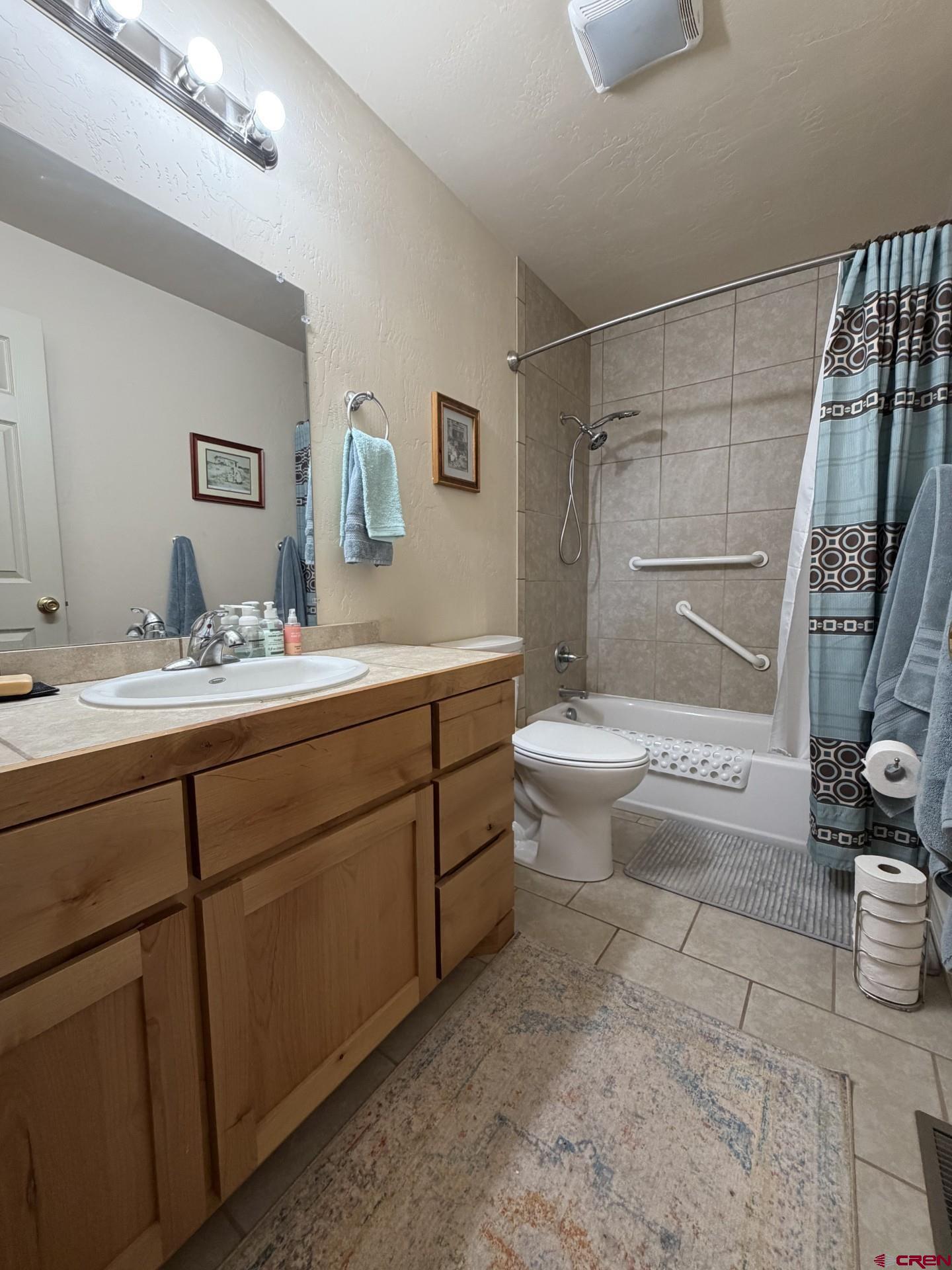 14617 2800th Road Hotchkiss, CO 81419 - Photo 29 of 37 a bathroom with a sink toilet and shower