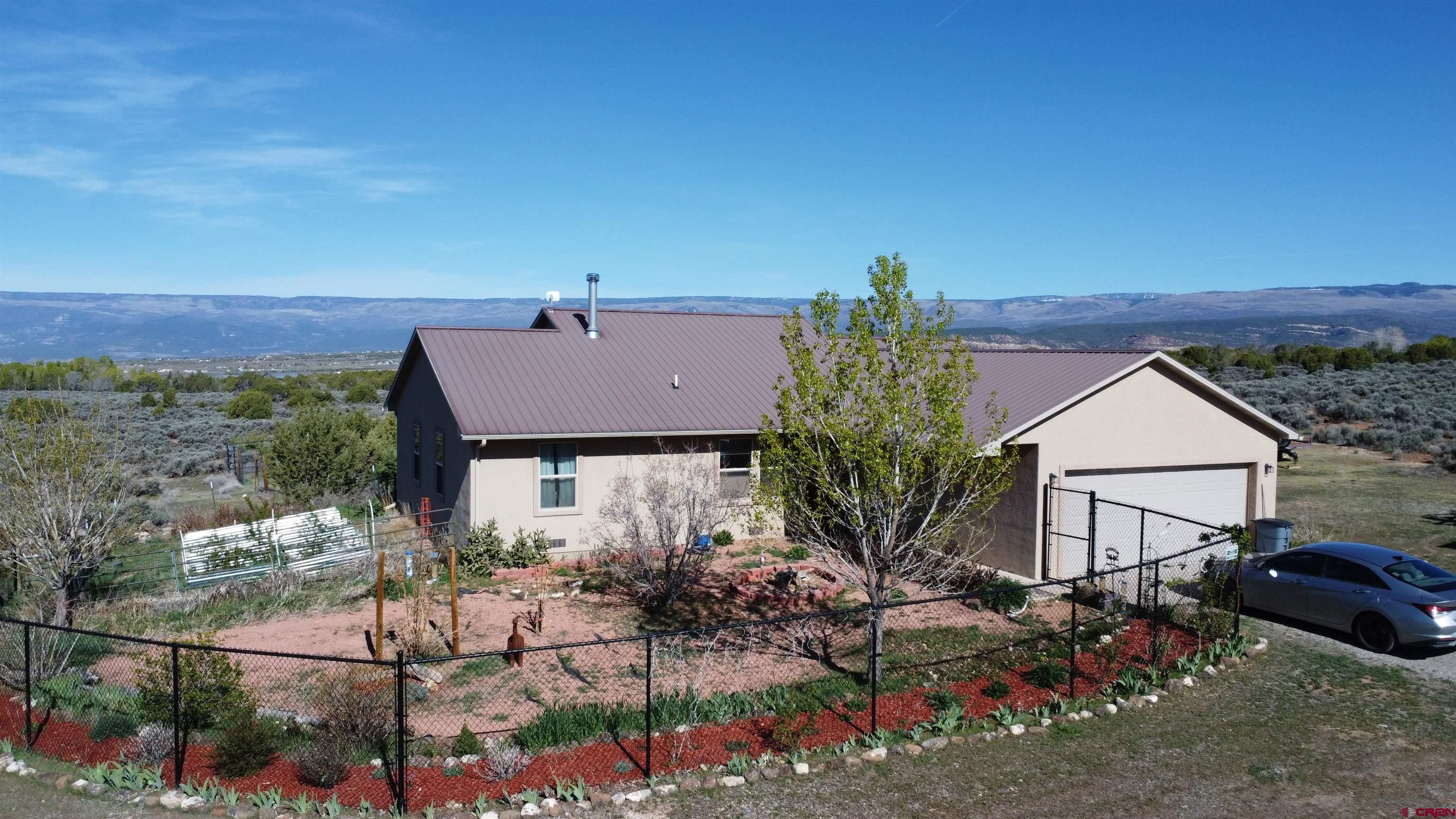 14617 2800th Road Hotchkiss, CO 81419 - Photo 4 of 37 an aerial view of multiple house