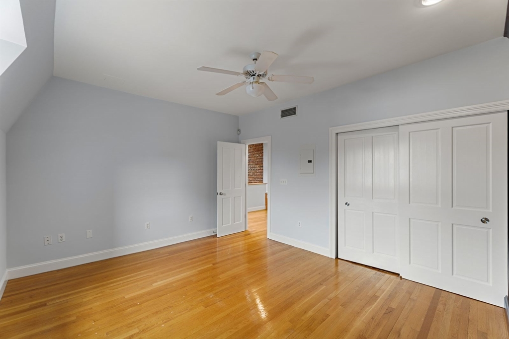 39 Worcester Square, Unit PH 5 Boston, MA 02118 - Photo 14 of 20 wooden floor in an empty room