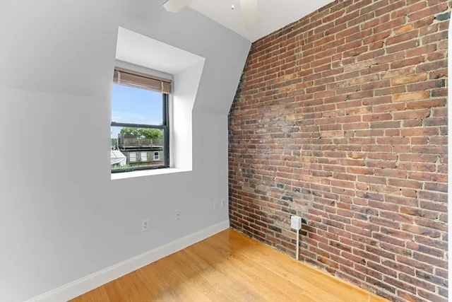 a view of an empty room and window