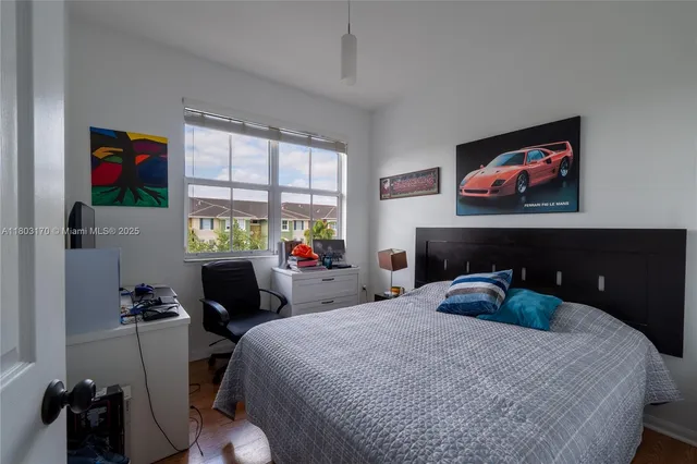 a bedroom with a bed and furniture