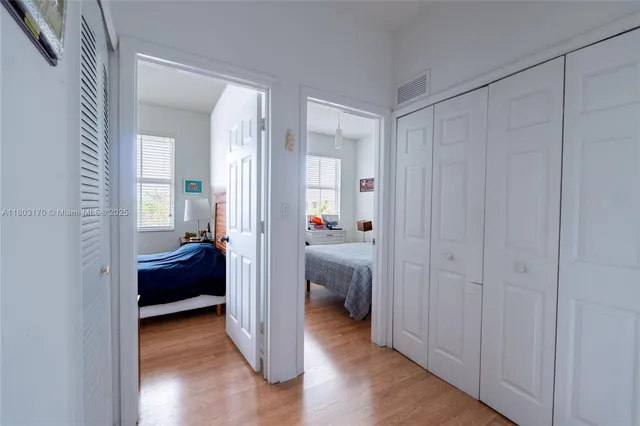a view of a bedroom from a hallway