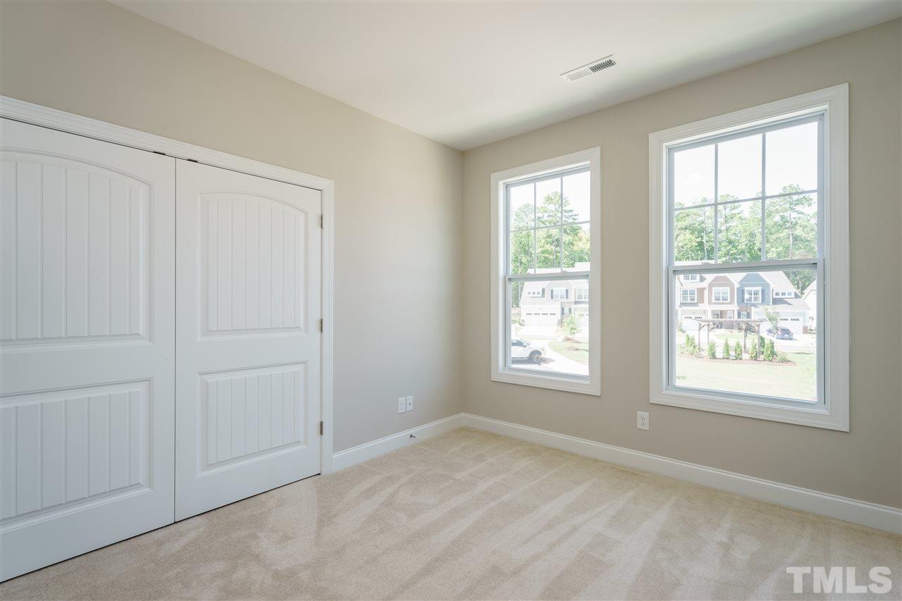 318 Roberts Ridge Drive Cary, NC 27513 - Photo 11 of 18 an empty room with windows