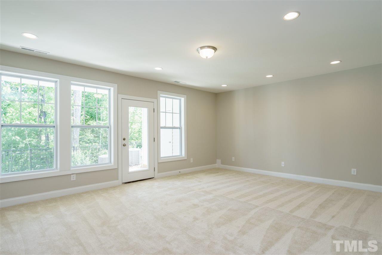 318 Roberts Ridge Drive Cary, NC 27513 - Photo 12 of 18 a view of an empty room with a window