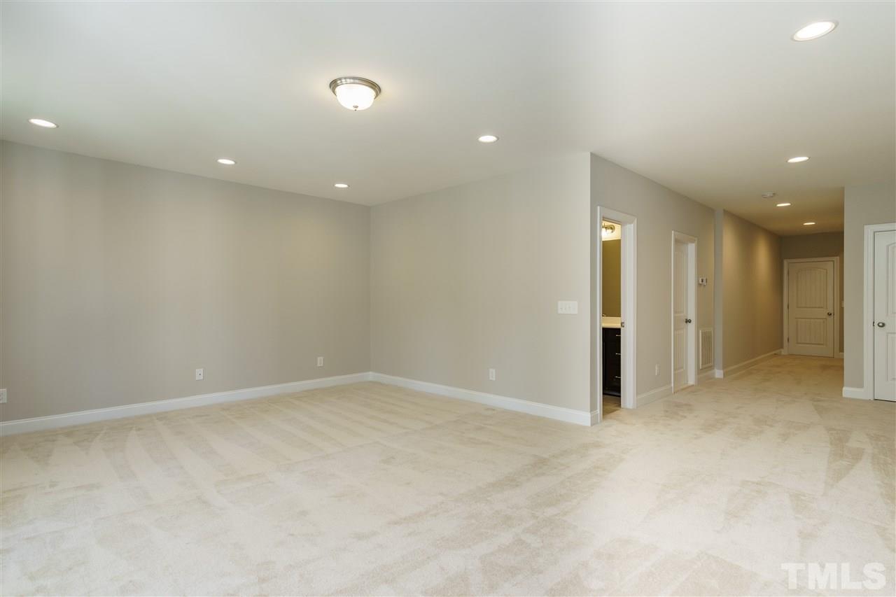 318 Roberts Ridge Drive Cary, NC 27513 - Photo 13 of 18 an empty room with an entryway