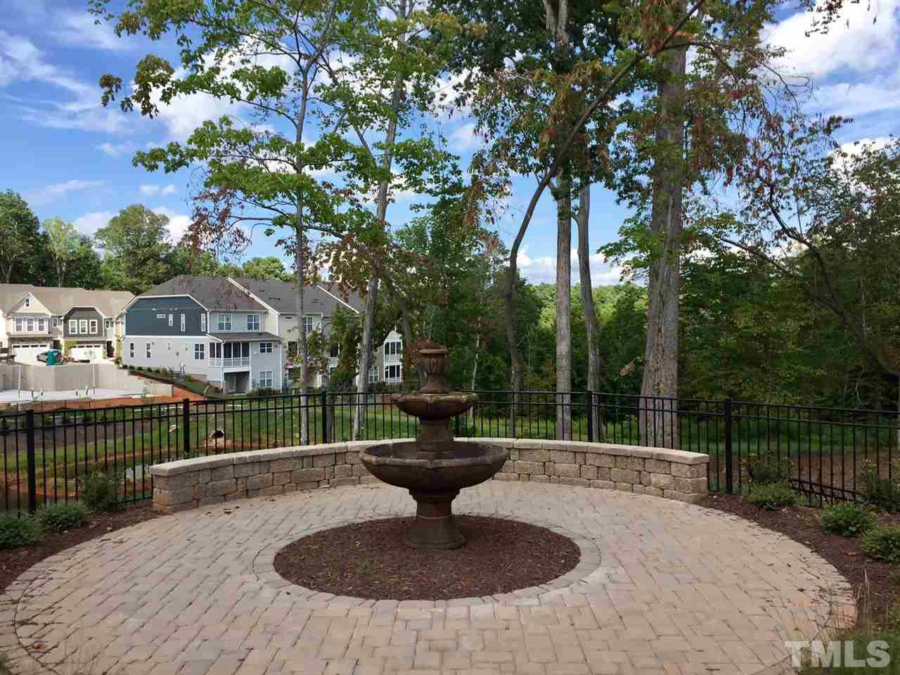 318 Roberts Ridge Drive Cary, NC 27513 - Photo 16 of 18 a view of a house with backyard and sitting area