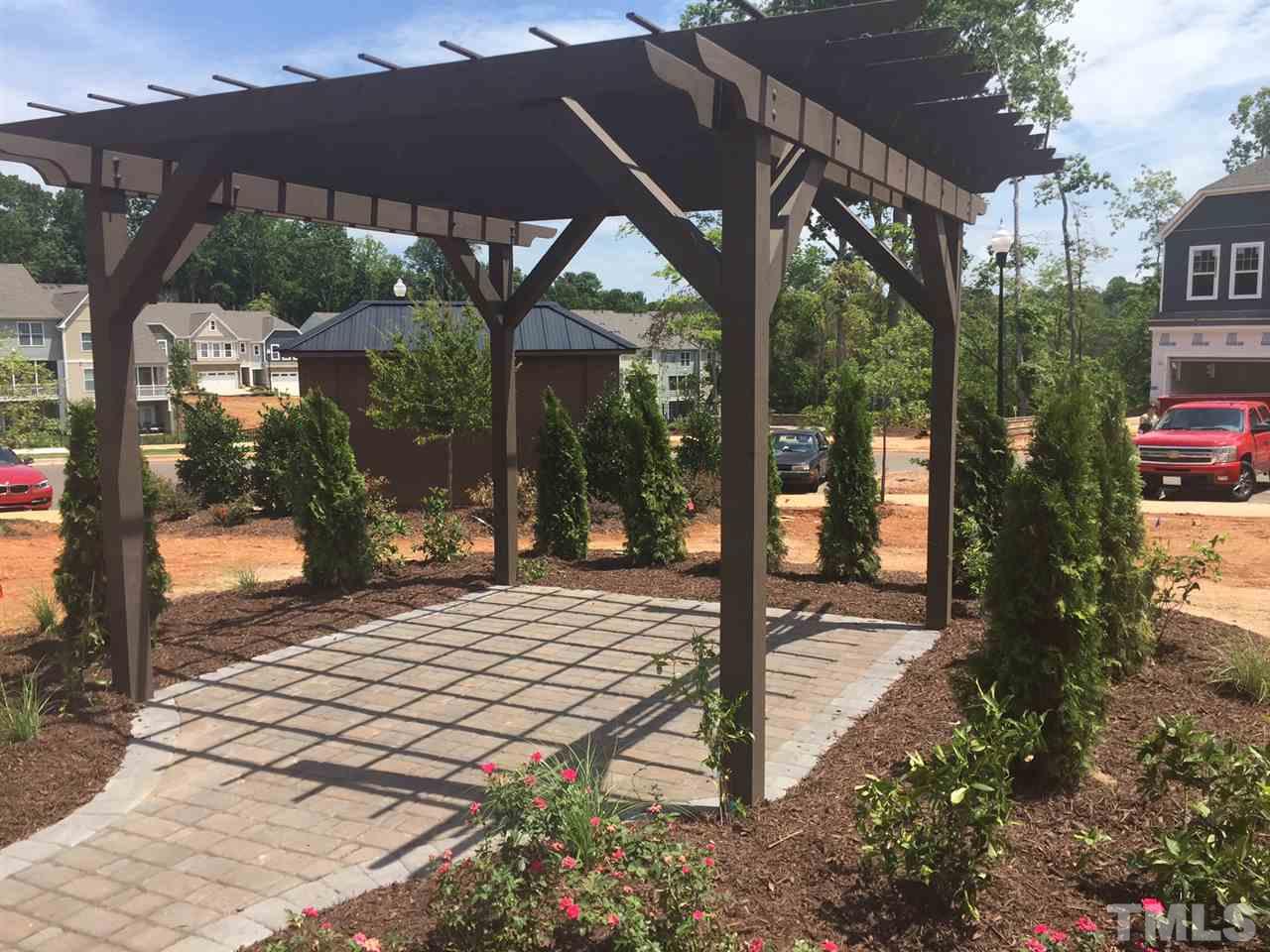 318 Roberts Ridge Drive Cary, NC 27513 - Photo 17 of 18 a view of a backyard