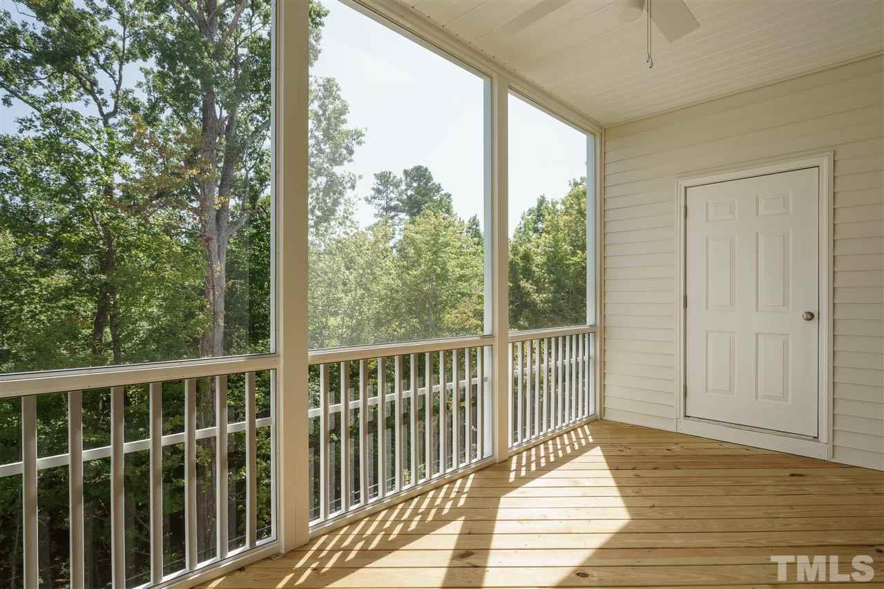 318 Roberts Ridge Drive Cary, NC 27513 - Photo 5 of 18 a view of a balcony with wooden floor