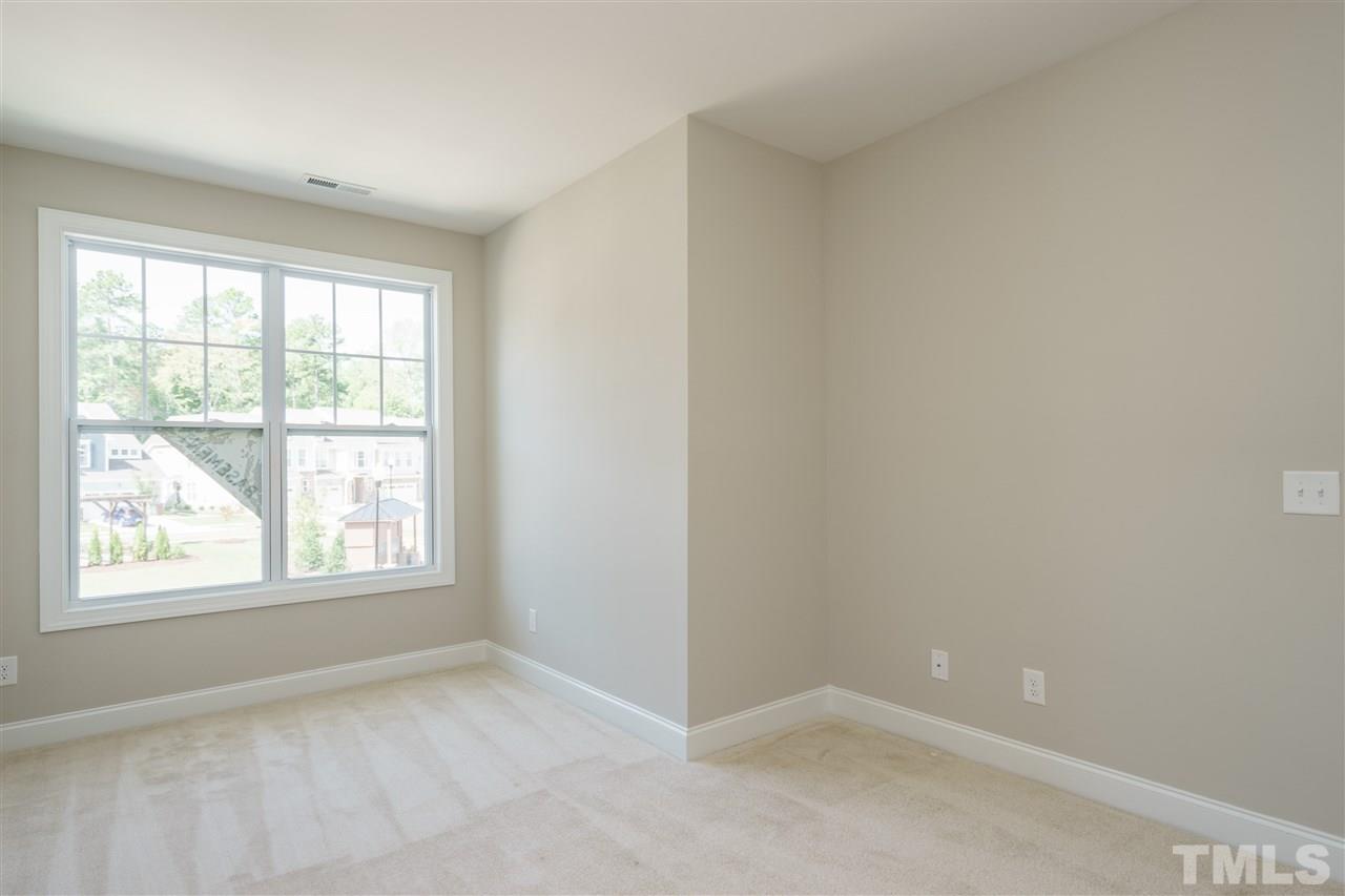 318 Roberts Ridge Drive Cary, NC 27513 - Photo 10 of 18 an empty room with windows