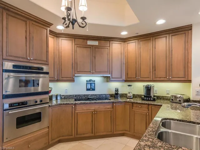 a view of living room with furniture and window