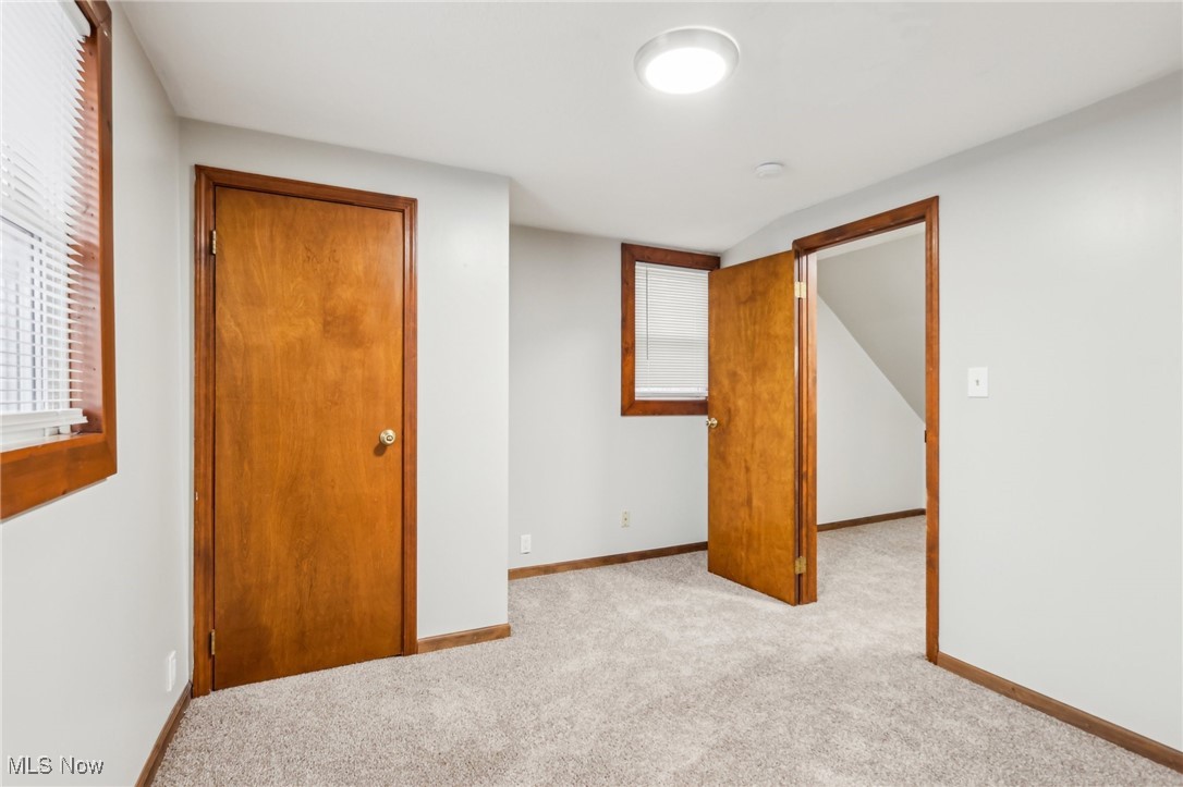 1573 Roselawn Road Cleveland, OH 44124 - Photo 16 of 25 Empty room featuring light carpet Bedroom #3