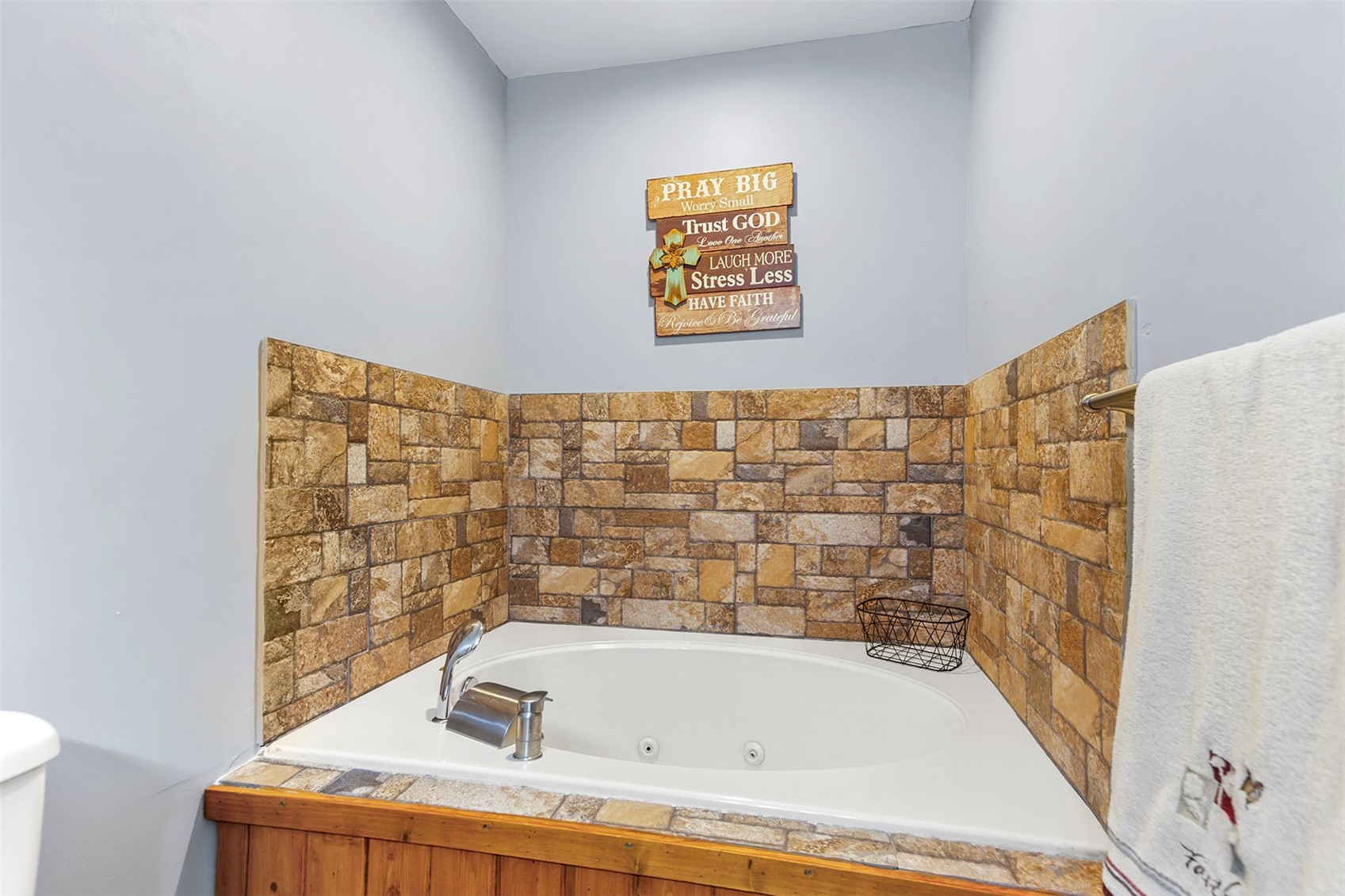 485 High Creek Road Fairplay, CO 80440 - Photo 21 of 32 Bathroom featuring a tub with jets and toilet