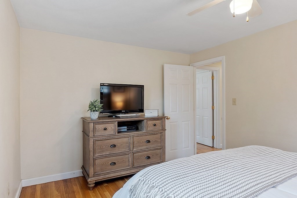 19 Rack Road Chelmsford, MA 01824 - Photo 23 of 37 a hotel room with a bed and a television in it
