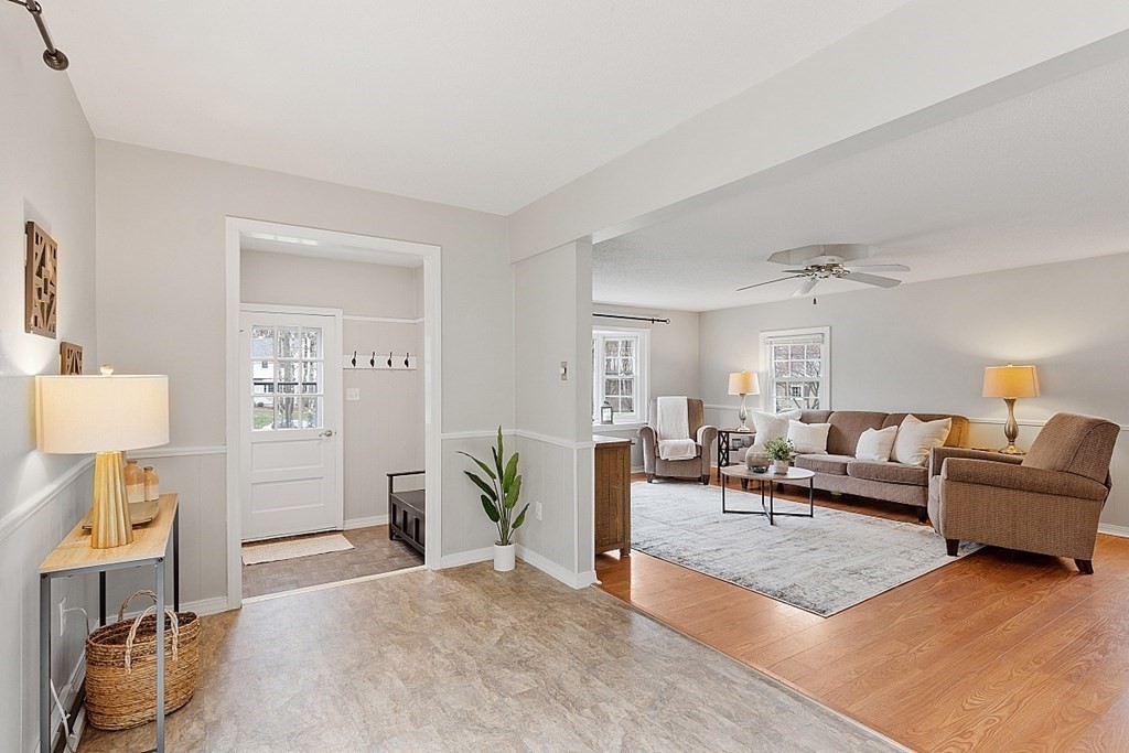 19 Rack Road Chelmsford, MA 01824 - Photo 3 of 37 a living room with furniture and wooden floor