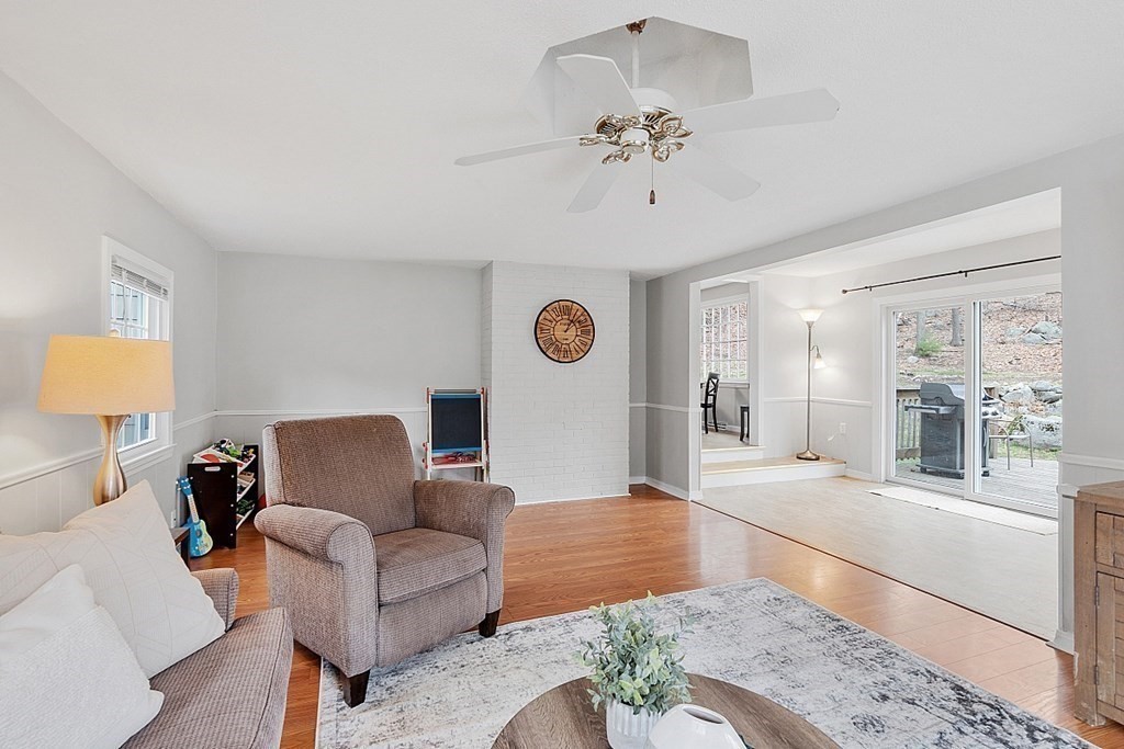 19 Rack Road Chelmsford, MA 01824 - Photo 8 of 37 a living room with furniture and a table