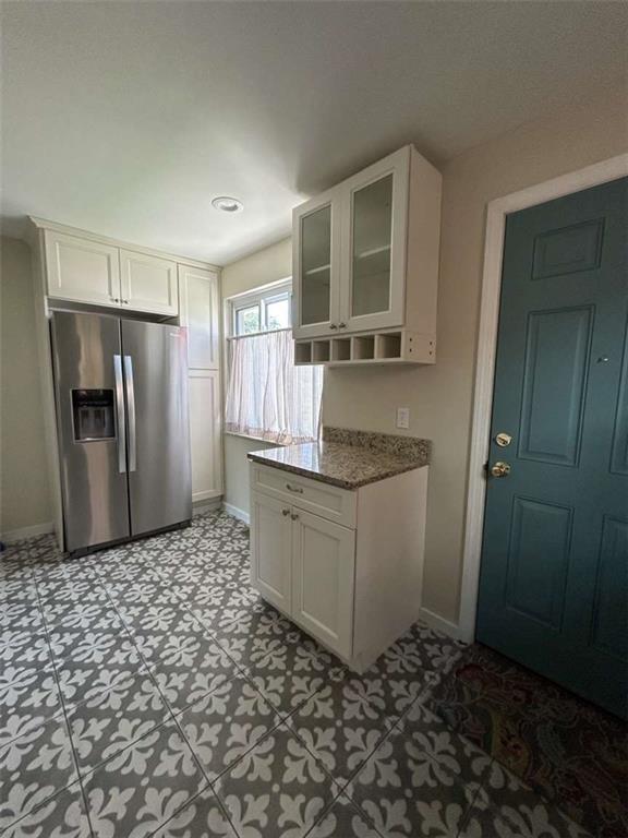 344 Spring Valley Road Pittsburgh, PA 15243 - Photo 4 of 10 a kitchen with a refrigerator and a sink