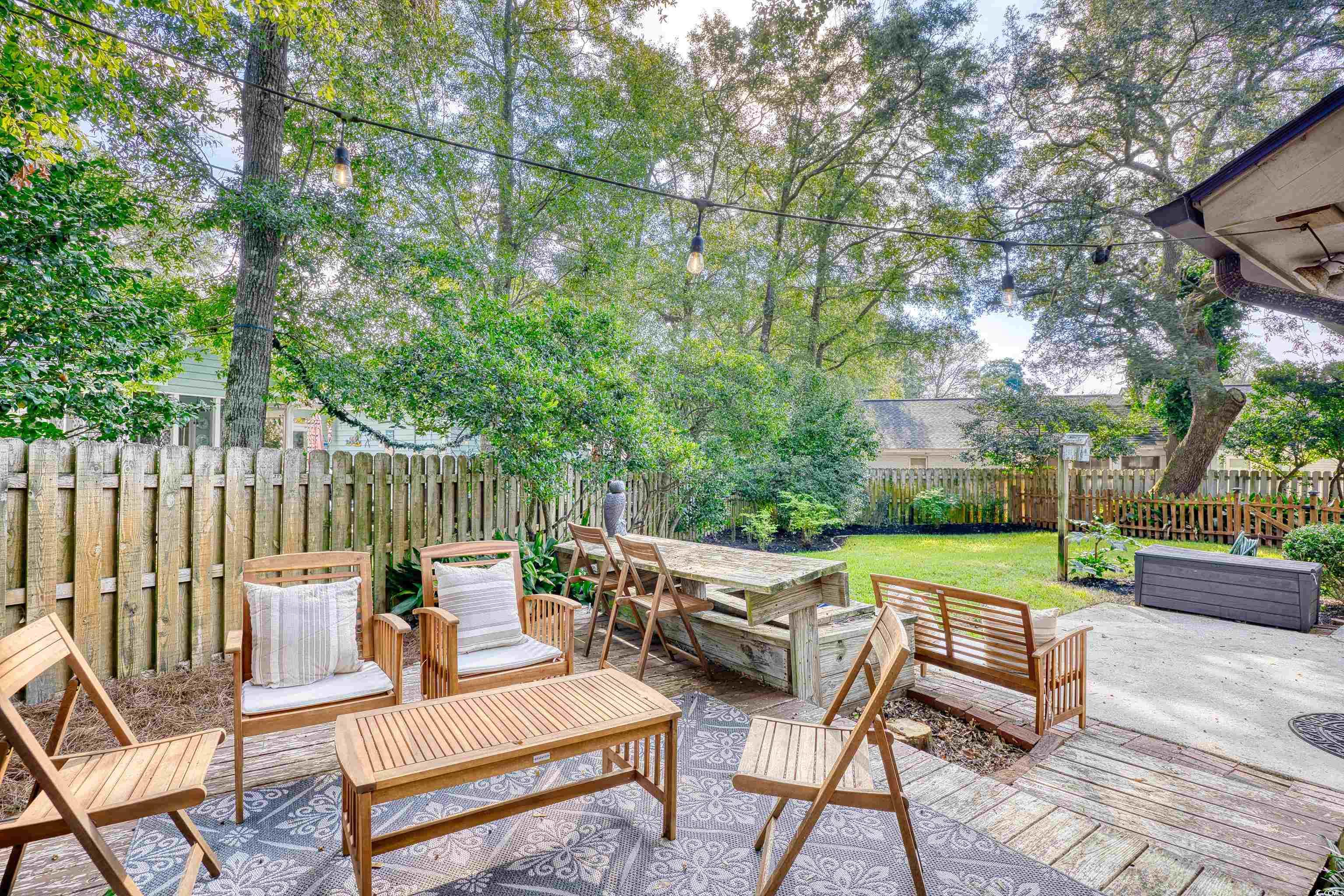 752 Kittiwake Lane Murrells Inlet, SC 29576 - Photo 31 of 35 View of patio with a wooden deck