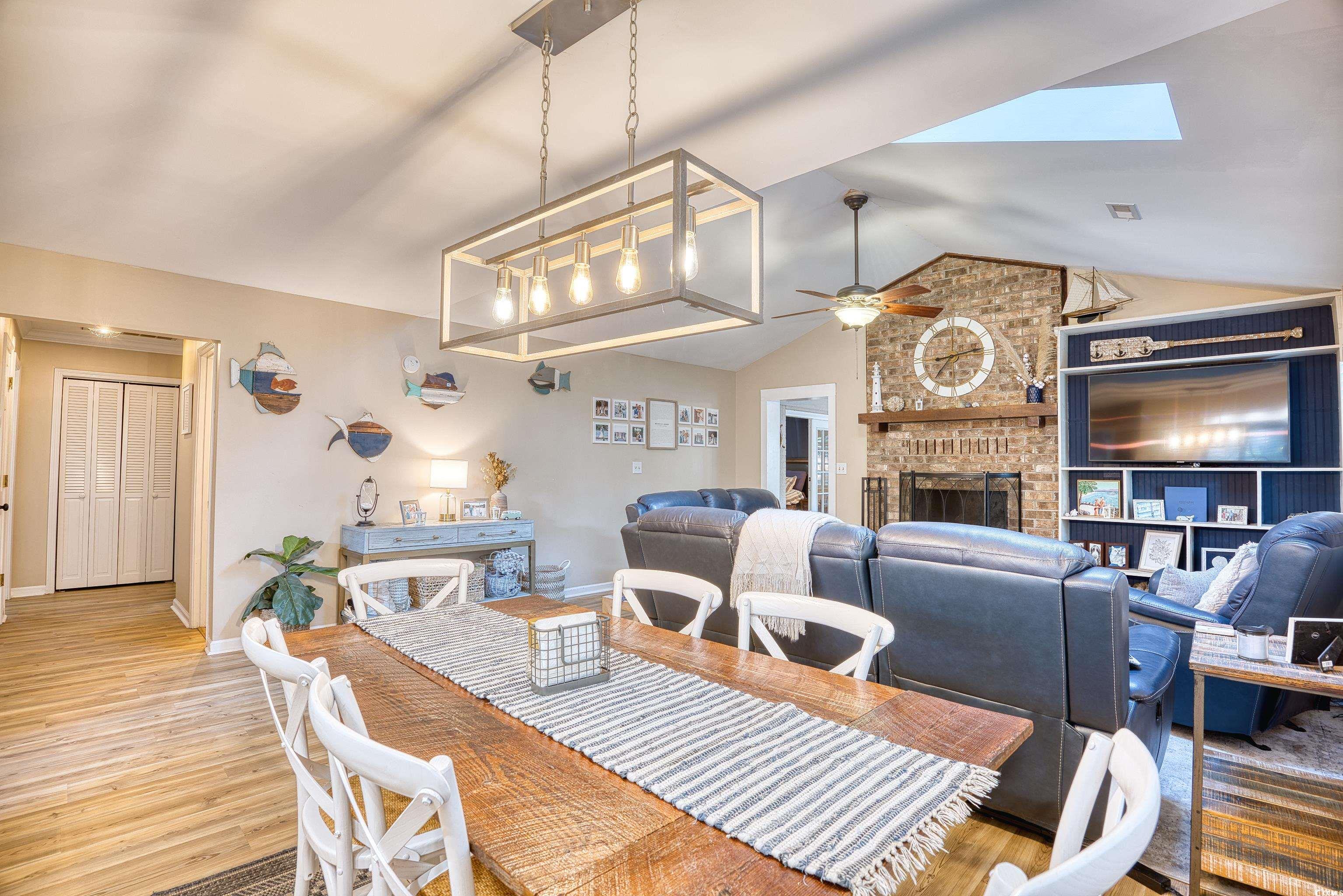 752 Kittiwake Lane Murrells Inlet, SC 29576 - Photo 7 of 35 Dining space with lofted ceiling with skylight