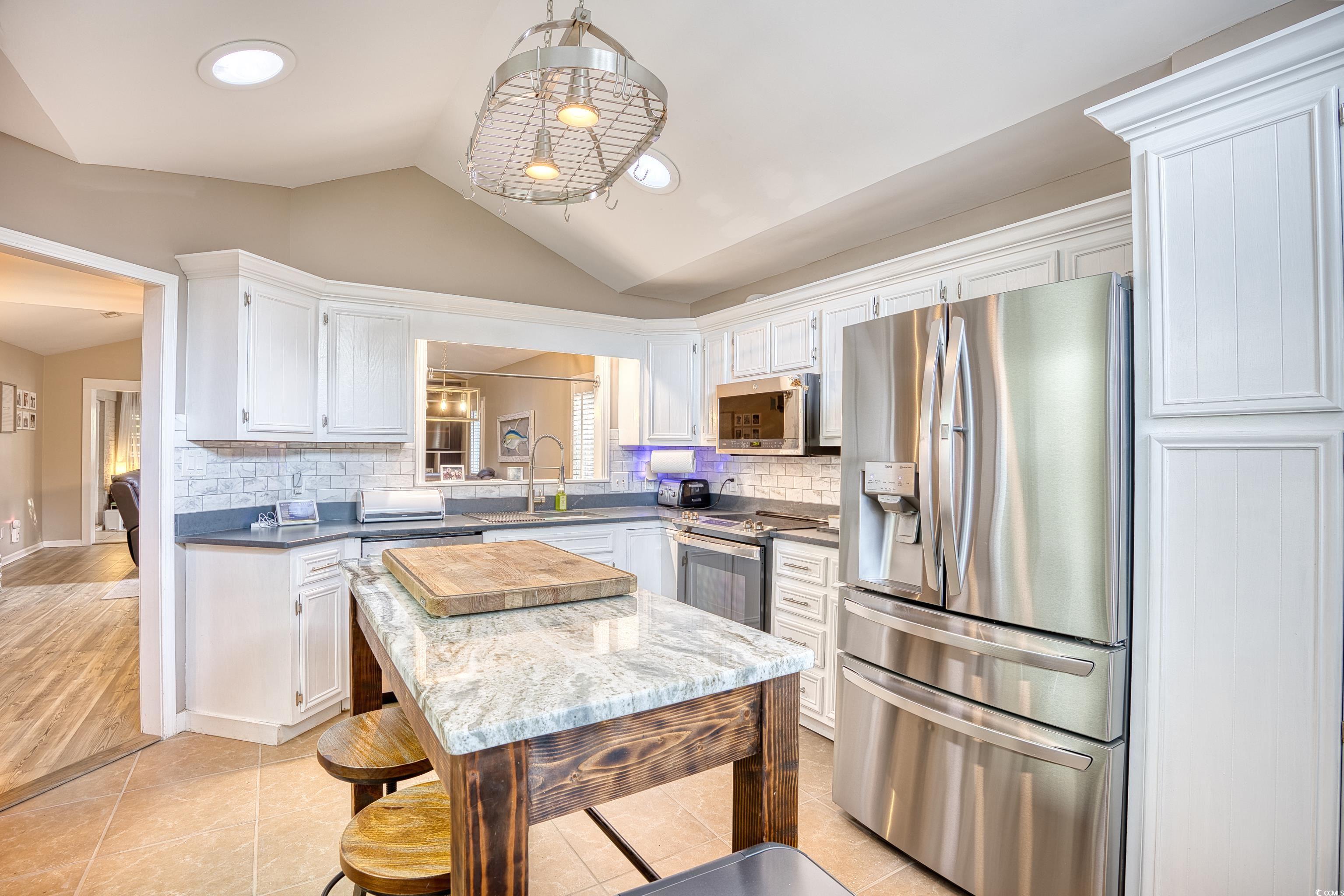 752 Kittiwake Lane Murrells Inlet, SC 29576 - Photo 10 of 35 Kitchen with appliances with stainless steel finis
