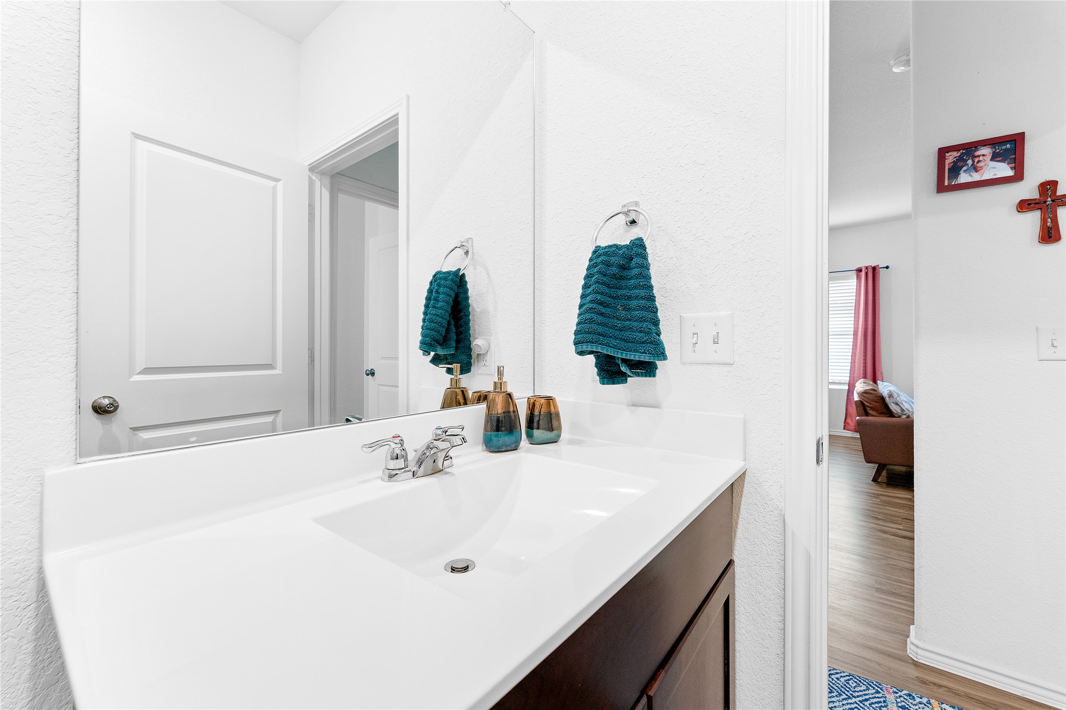 6009 Jagger Avenue Austin, TX 78747 - Photo 20 of 24 a bathroom with a sink and a mirror