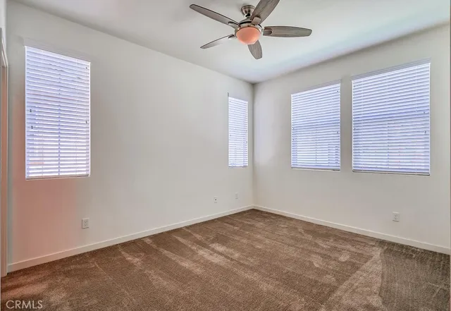 a view of a room that has a window in it