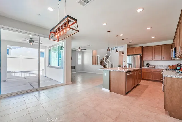 a view of a kitchen with furniture and a kitchen