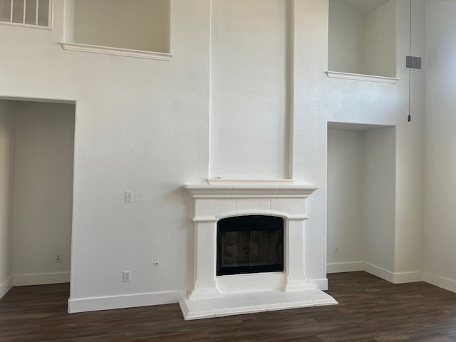1374 Red Stag Place Round Rock, TX 78665 - Photo 14 of 34 Detailed view of wood finished floors and a glass covered fireplace