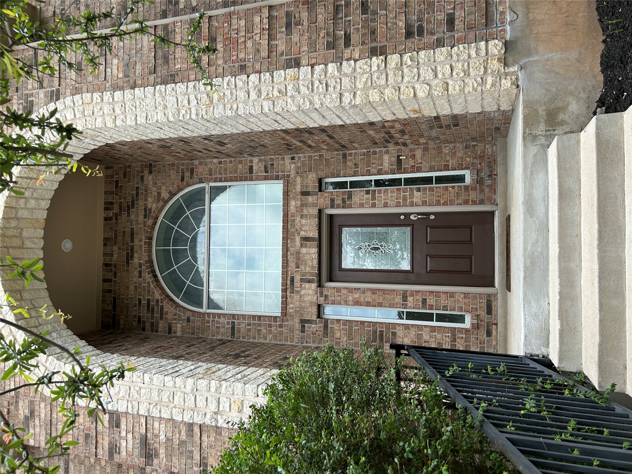 1374 Red Stag Place Round Rock, TX 78665 - Photo 32 of 34 Doorway to property with brick siding