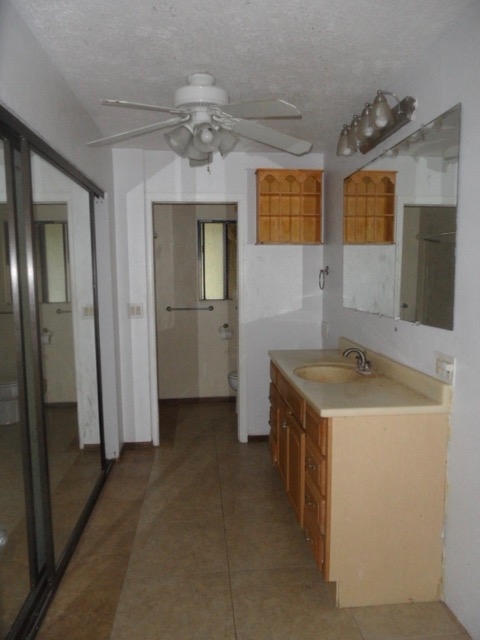 120 Peahi Road Haiku, HI 96708 - Photo 15 of 26 a bathroom with a sink and a mirror
