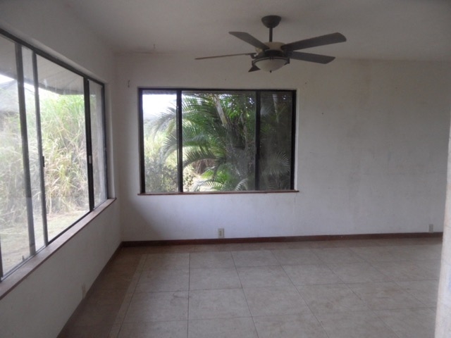 120 Peahi Road Haiku, HI 96708 - Photo 7 of 26 a view of an empty room with a window