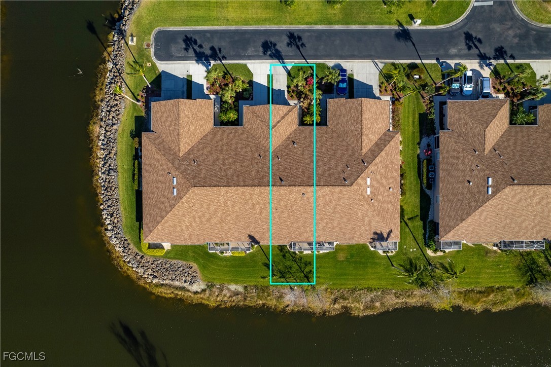 14217 Prim Point Lane Fort Myers, FL 33919 - Photo 31 of 46 an aerial view of a house with a yard basket ball court and outdoor seating