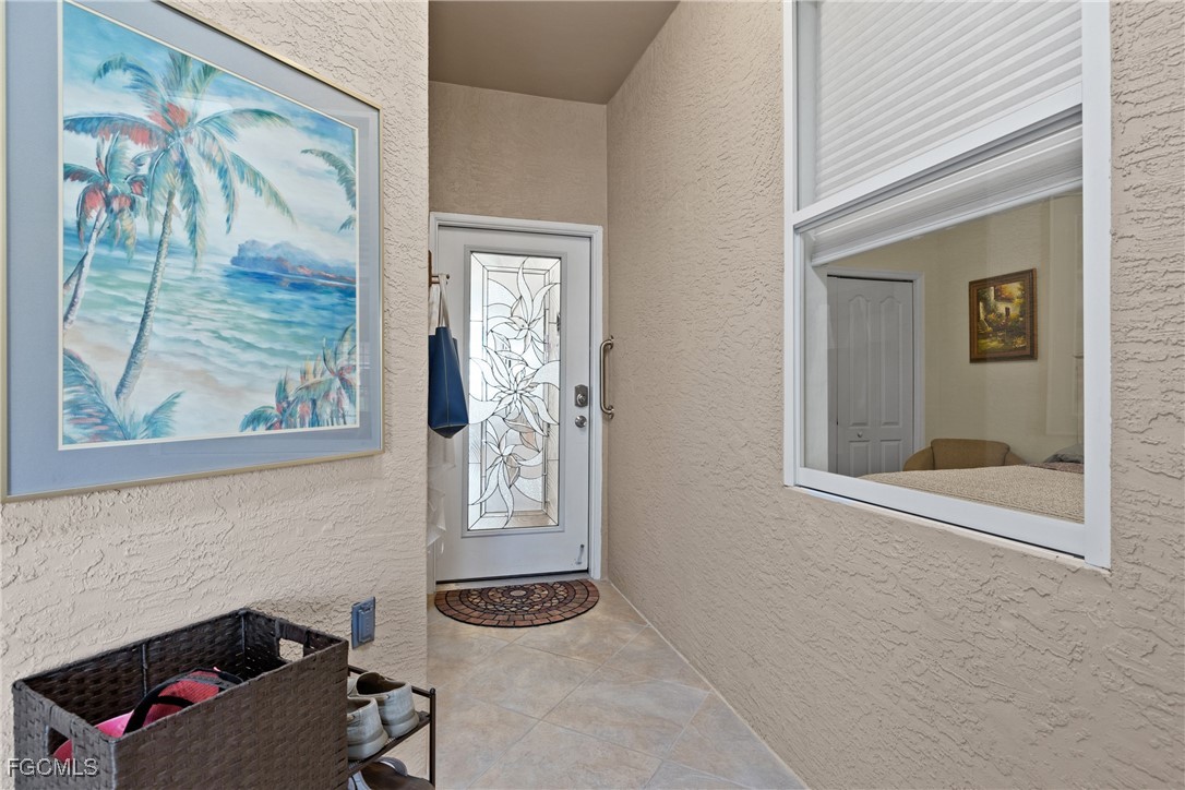 14217 Prim Point Lane Fort Myers, FL 33919 - Photo 8 of 46 a bathroom with a window and a mirror