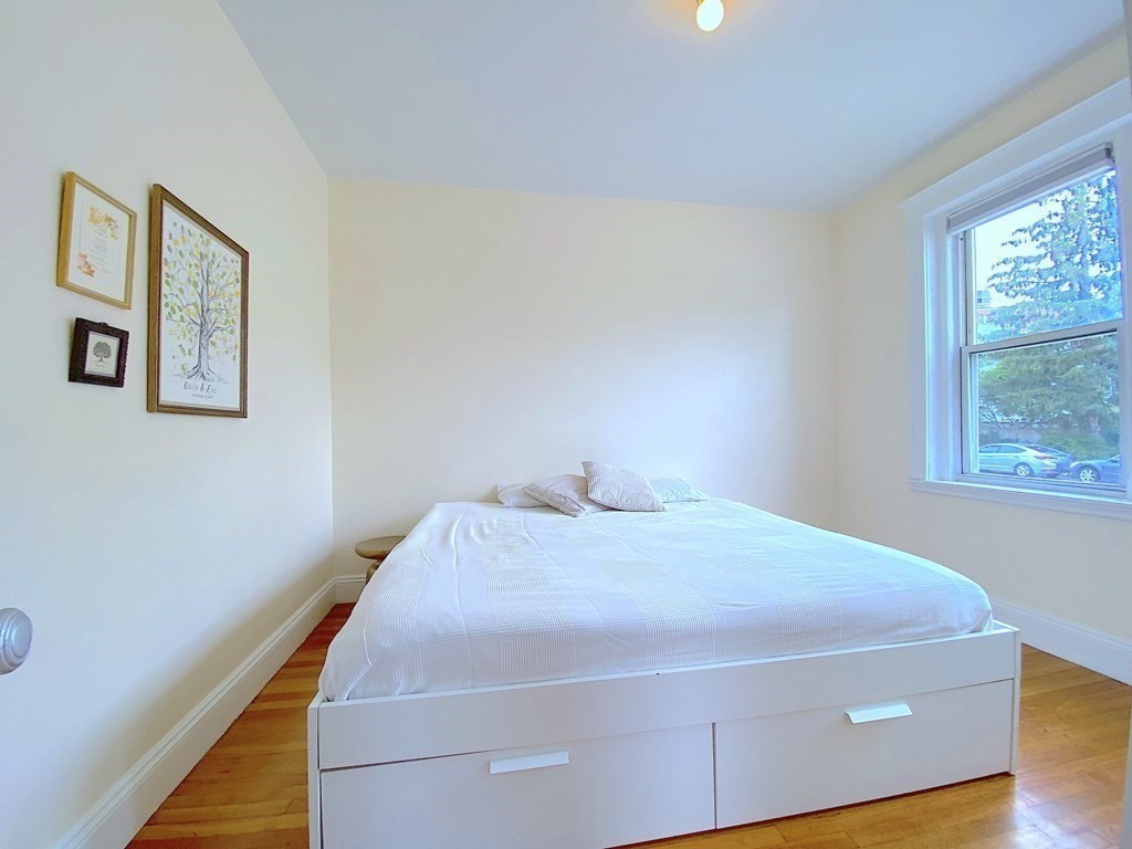 91 Bynner Street, Unit 1 Boston, MA 02130 - Photo 13 of 35 a bedroom with a bed and a window