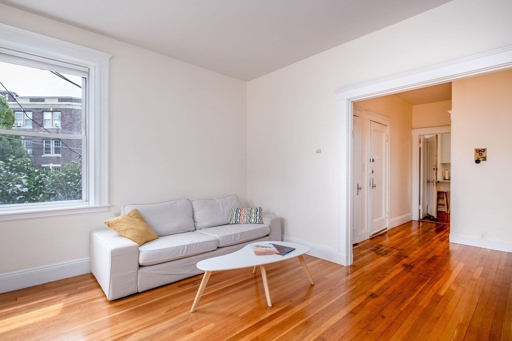91 Bynner Street, Unit 1 Boston, MA 02130 - Photo 4 of 35 a living room with furniture and a window