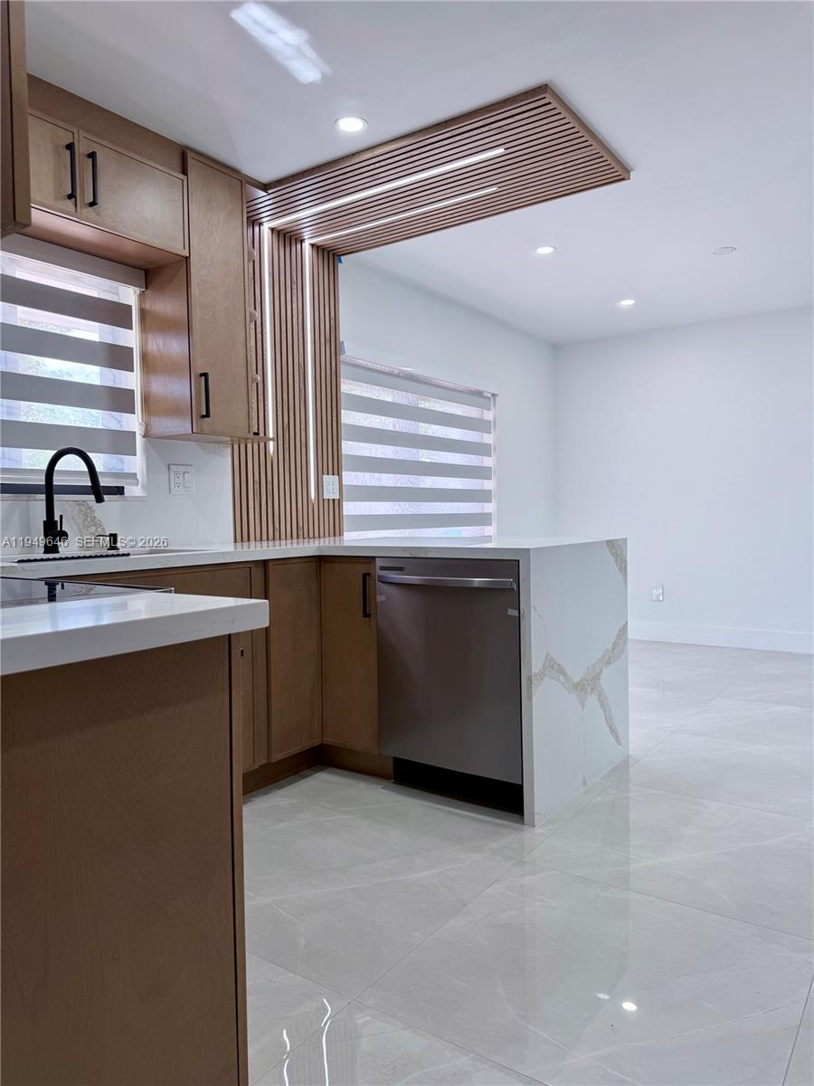 15235 Southwest 108th Court Miami, FL 33157 - Photo 11 of 25 a kitchen with a sink cabinets and window