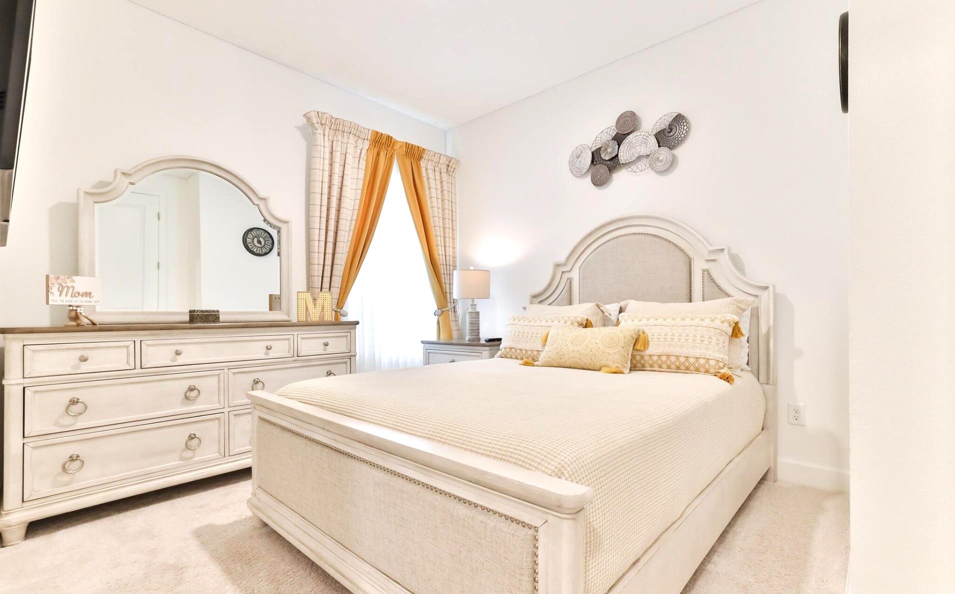 48 Martha Ct Street St. Augustine, FL 32092 - Photo 8 of 11 a bedroom with a bed and a dresser