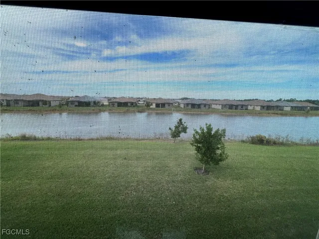 a view of a lake with a city