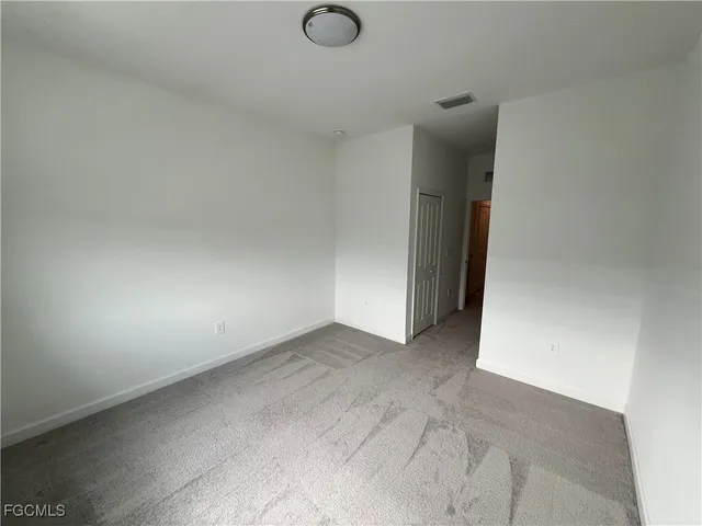 an empty room with an entryway