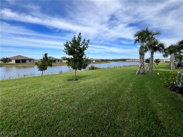 a view of a garden with a lake