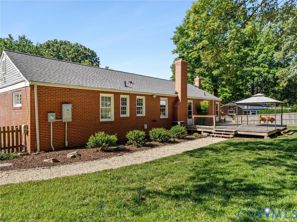 7720 Prairie Road Richmond, VA 23225 - Photo 36 of 49 Brick exterior with a gabled roof and white trim