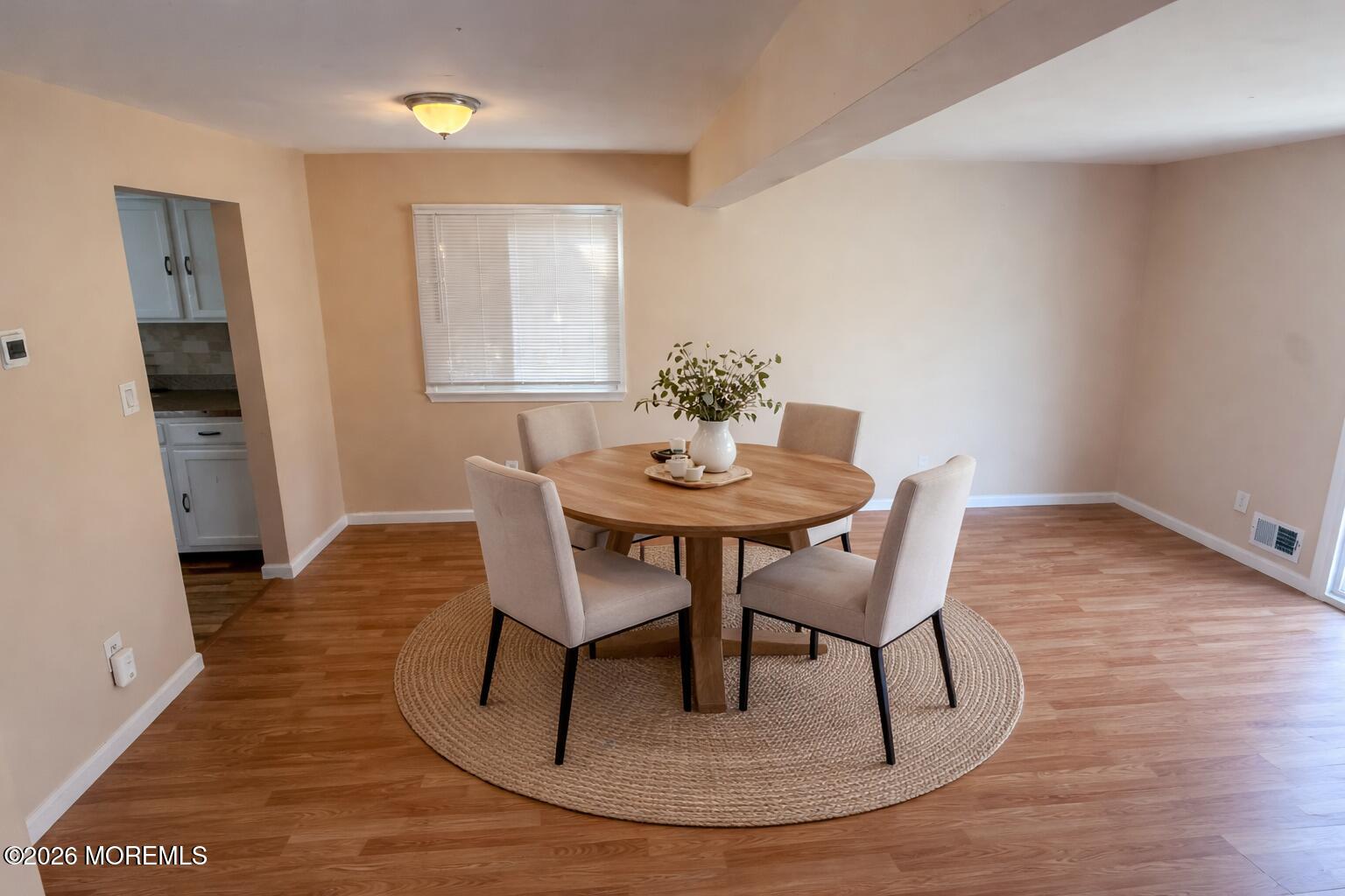1 Max Place Howell, NJ 07731 - Photo 2 of 16 a dining room with furniture and wooden floor